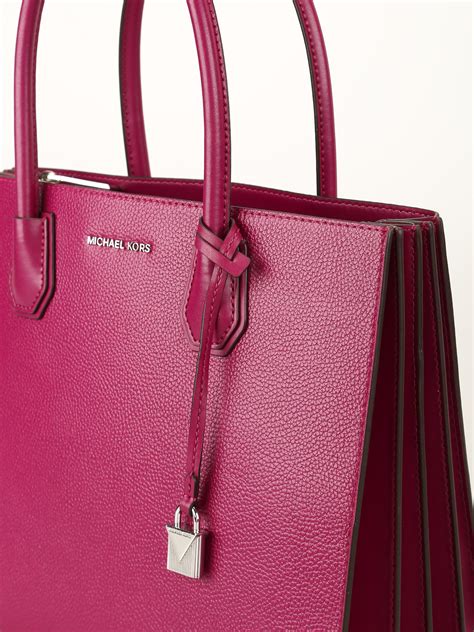 michael kors tas acrdion|Michael Kors tote bags.